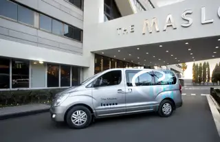 Maslow Porte Cochere With Branded Vehicle 0123
