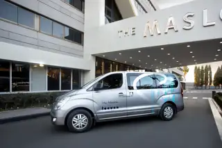 Maslow Porte Cochere With Branded Vehicle 0123