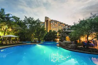 Signature Cascades Pool Exterior Night