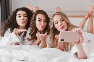 Sun Celebrations Women Bed Phone Blowing Kisses