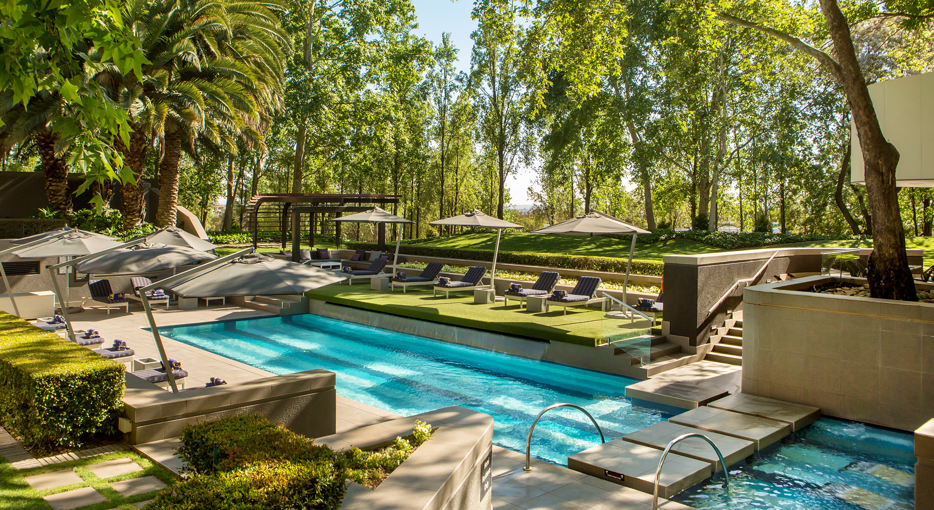 Maslow Pool Area With Garden