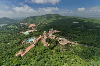 Sun City Aerial View Of The Palace And Valley Of Waves (1)