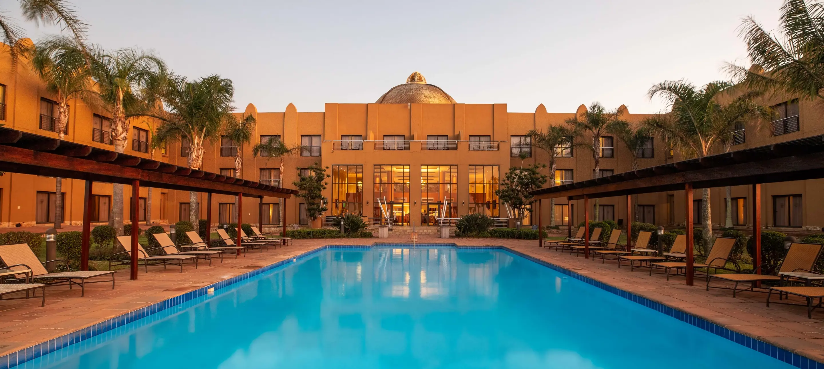 Siba Exterior Evening Royal Lodge Pool 1